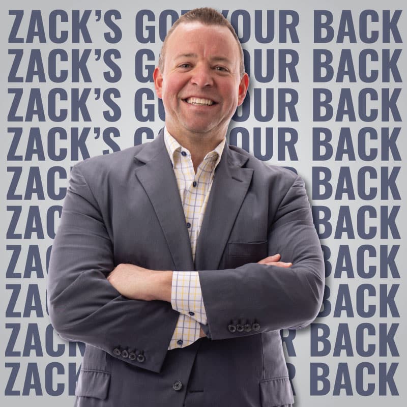Injury Lawyer Zack England in Front of Text That Reads "Zack's Got Your Back"